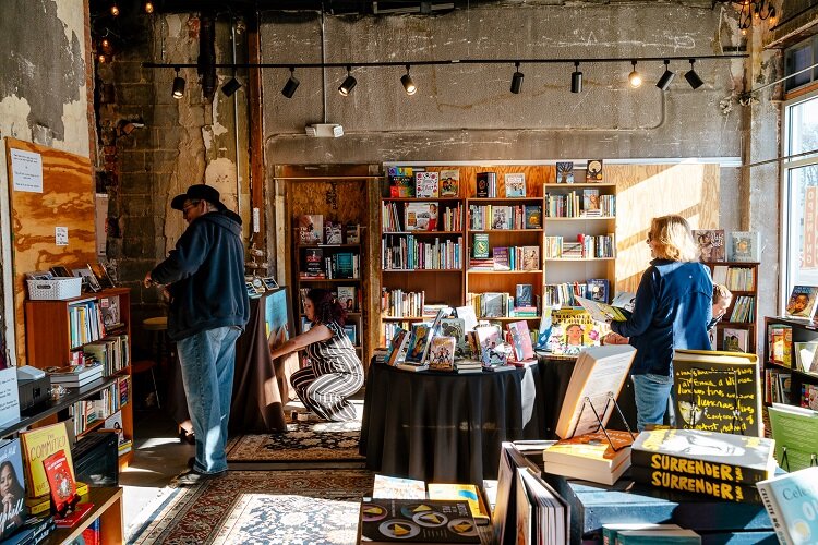 A visitor stops into Next Chapter Books at the Alger Theater.