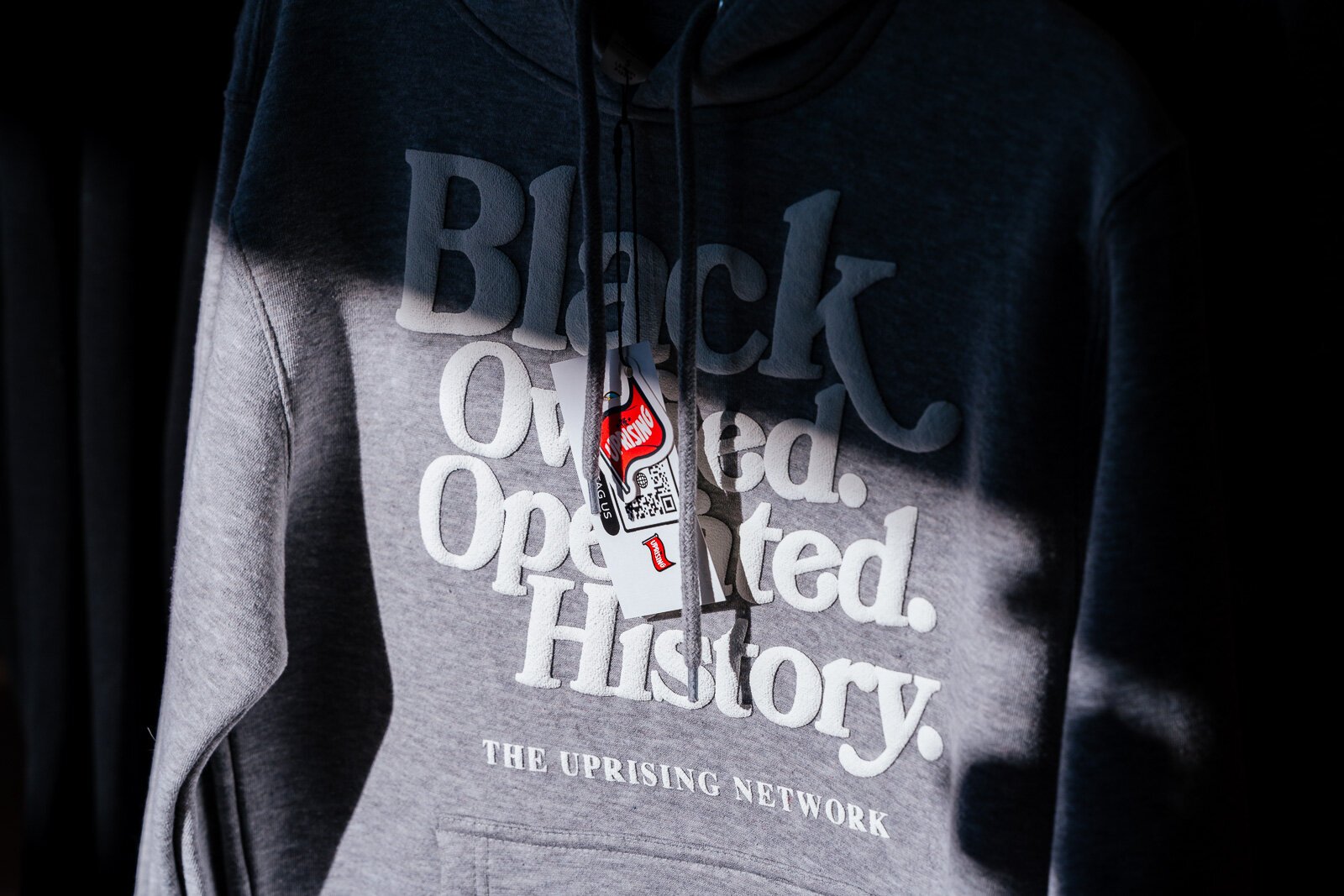 Hoodies from the Uprising Network on sale at Neighborhood Grocery.