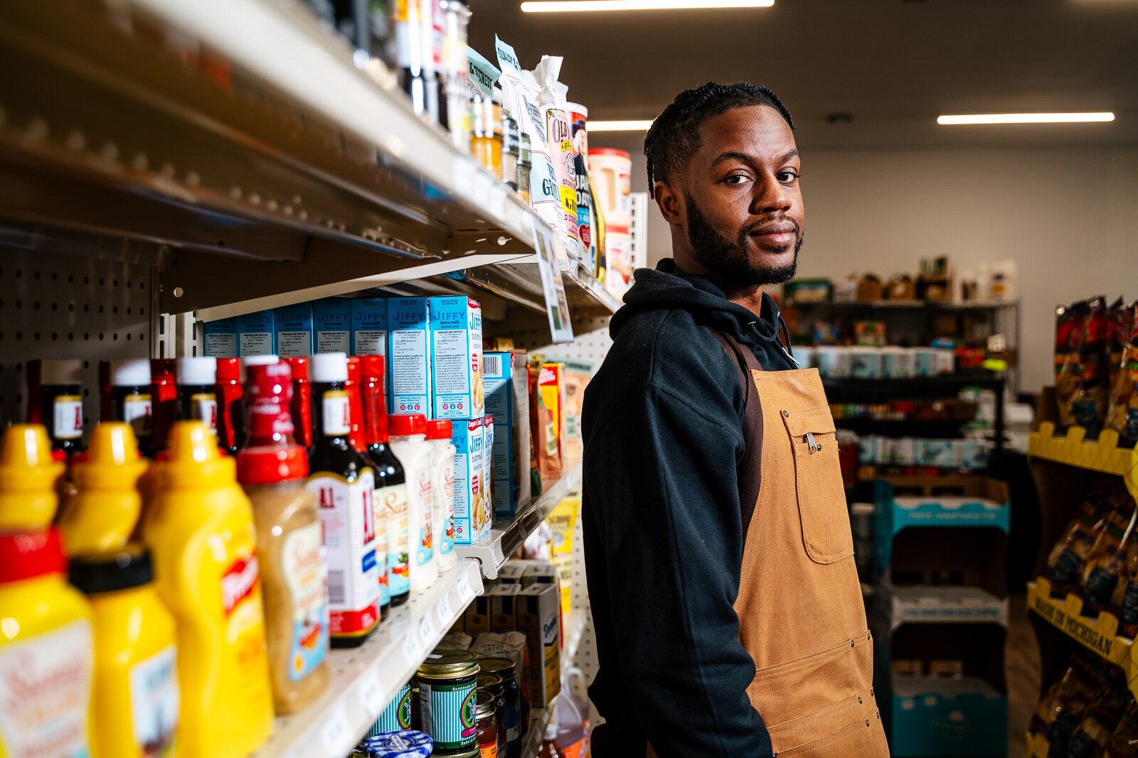 Co-manager Kevante "KG" Grimes in Neighborhood Grocery.