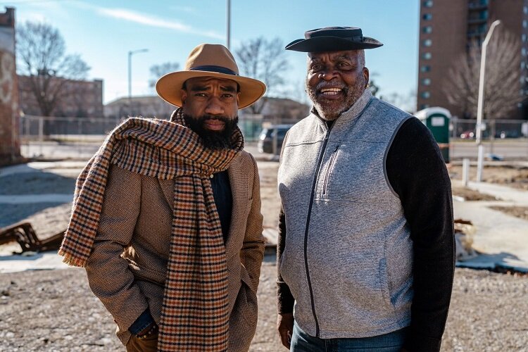 Rod Hardamon and George N'namdi look out over the future site of Osi Art Apartments.