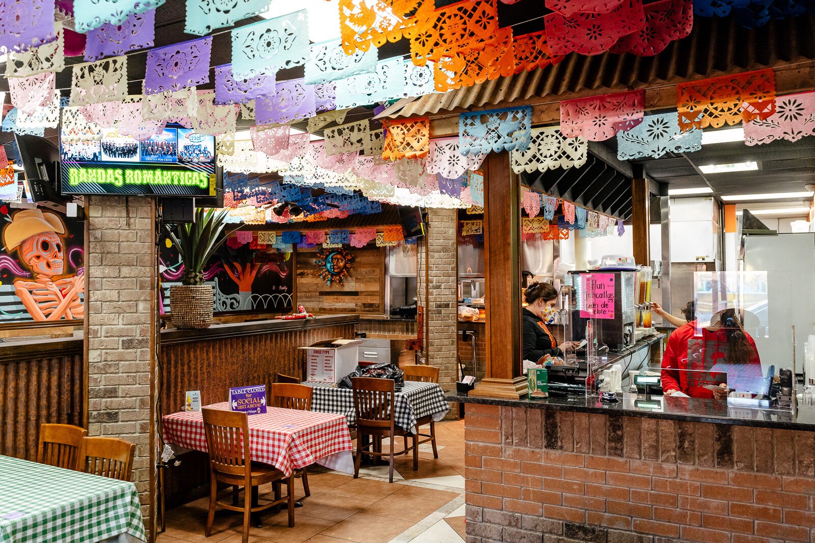 The dining area at A view of the sidewalk booths at La Palapa del Parian restaurant.