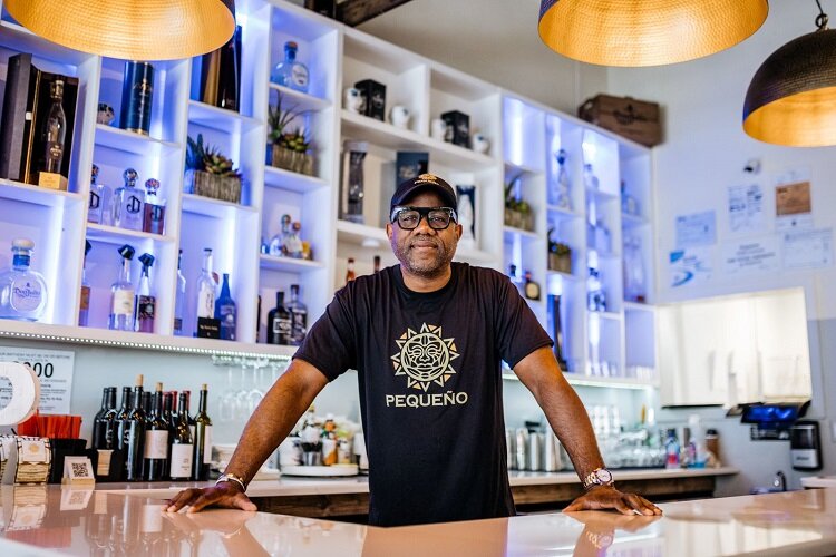 Frank Blackman stands at the Pequeño Cantina bar.