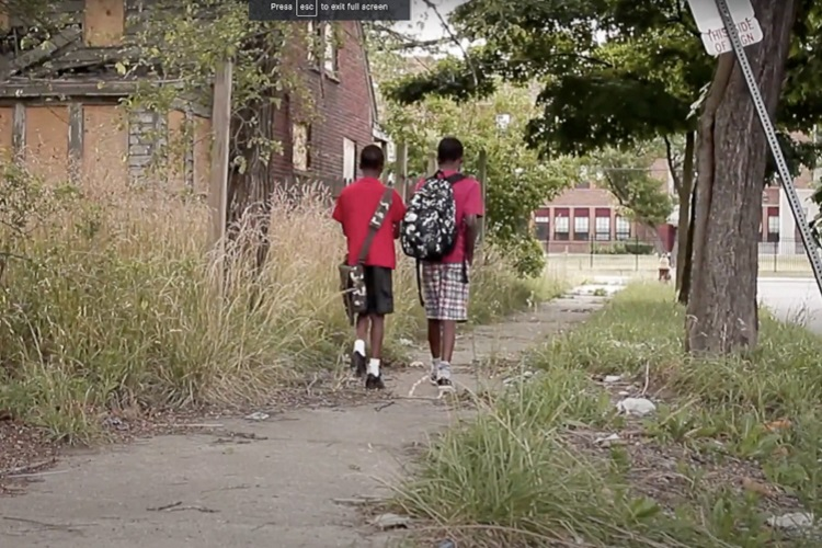 Youth walk through overgrown fields before Regent Park's revitalization.