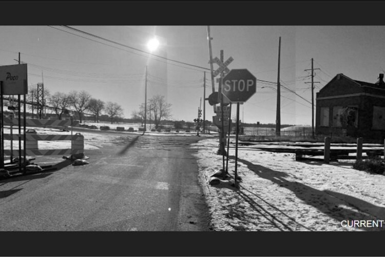 Image of Riverside Park by railroad track before renovations.