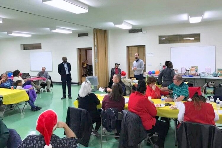 Residents of Warrendale have some fun at a WCO holiday party.