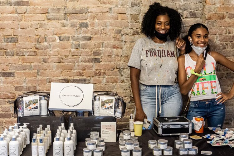 Rana, owner of vegan skincare line Skyn Studio, with her daughter