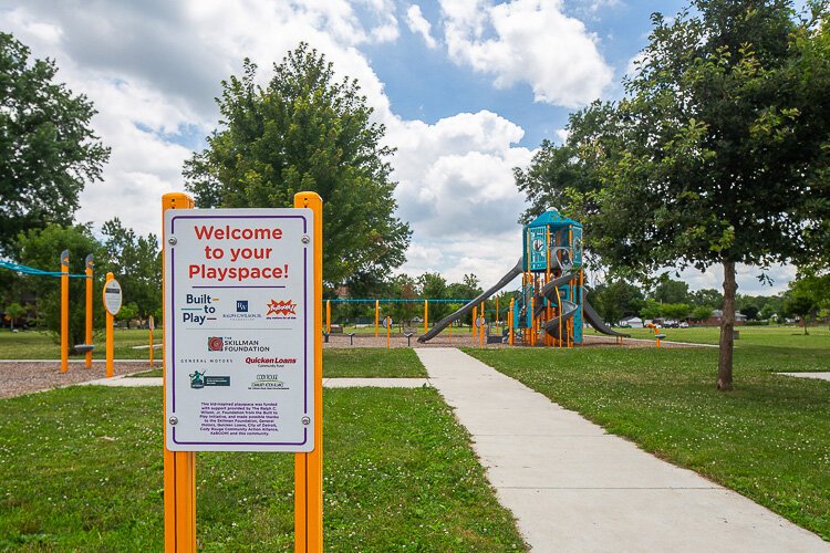 Playscape with sign at Stein Park.