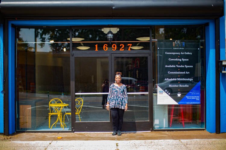 Denise Moore stands in front of ZAB Cultural Collective, her new art gallery and coworking space in East English Village. 