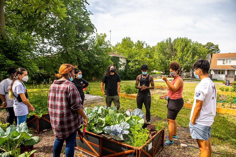 SFC members gather to grow food and learn how to cook.