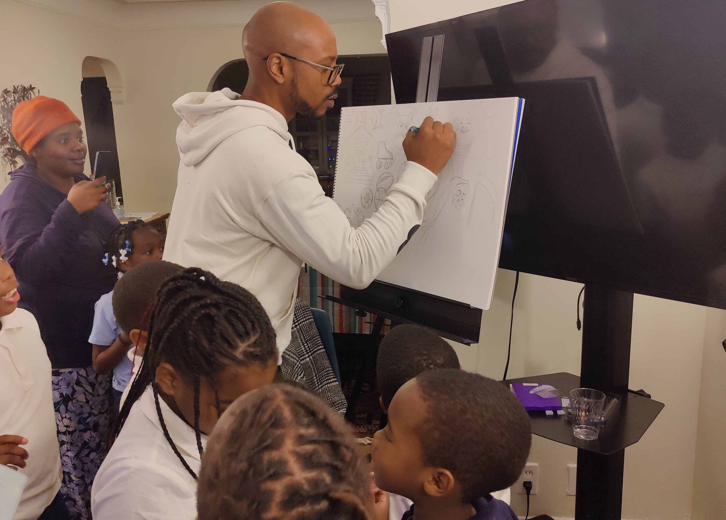 Clifton "Clifnotes" Perry turns youth voices into powerful visual images at a youth listening session.