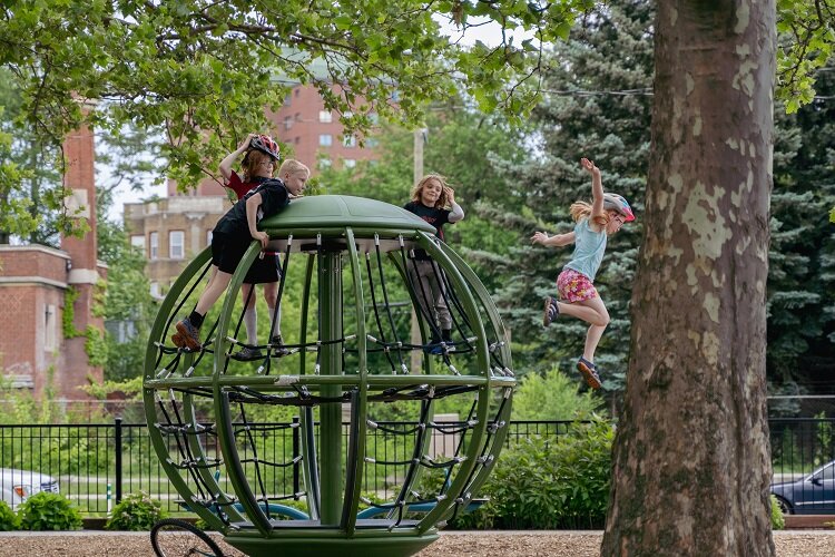 Kids climb and play at Scripps Park in Woodbridge.