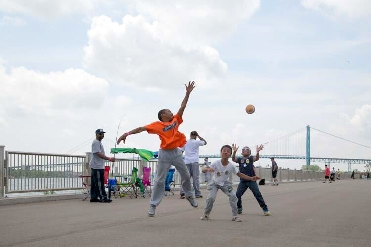 Some youth play around at West Riverfront Park.