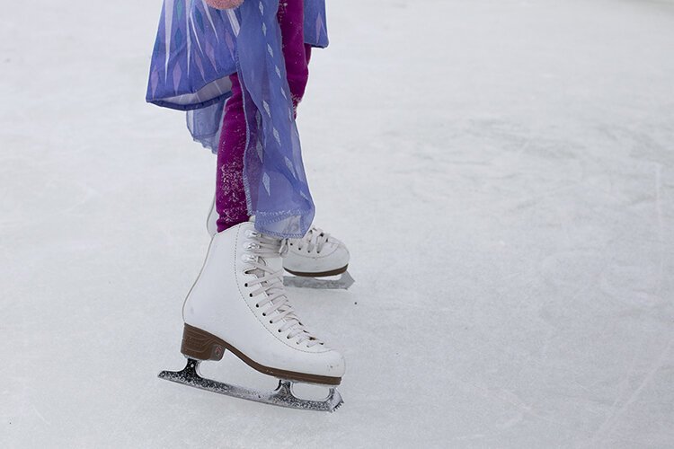 Skaters enjoy an outdoor ice skating rink, located on S. Riverside Avenue between Cass Street and Clinton Avenue in St. Clair, Michigan.