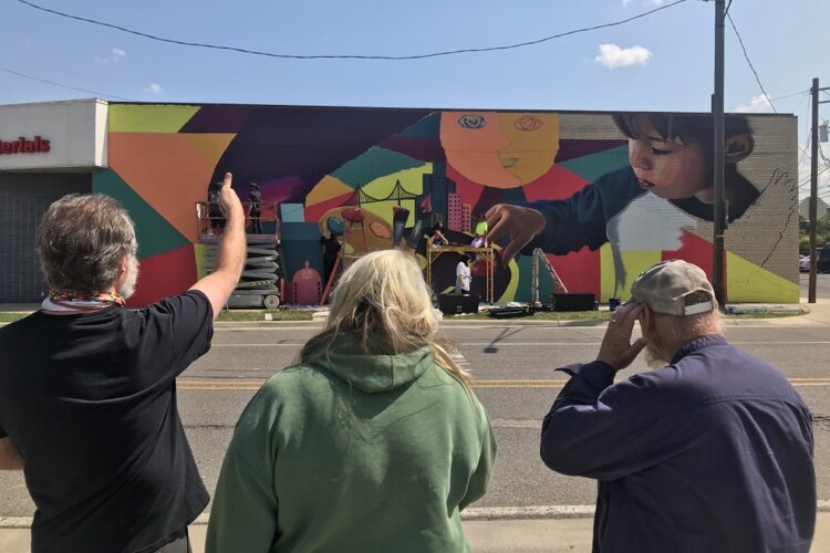 Work on the mural from POP Design Team stretched from late July into August.