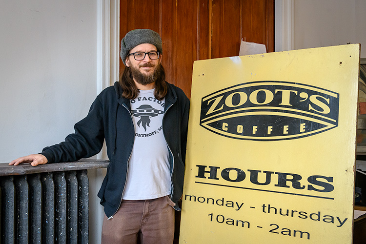 Zoot's owner Aaron Anderson standing by the former stage