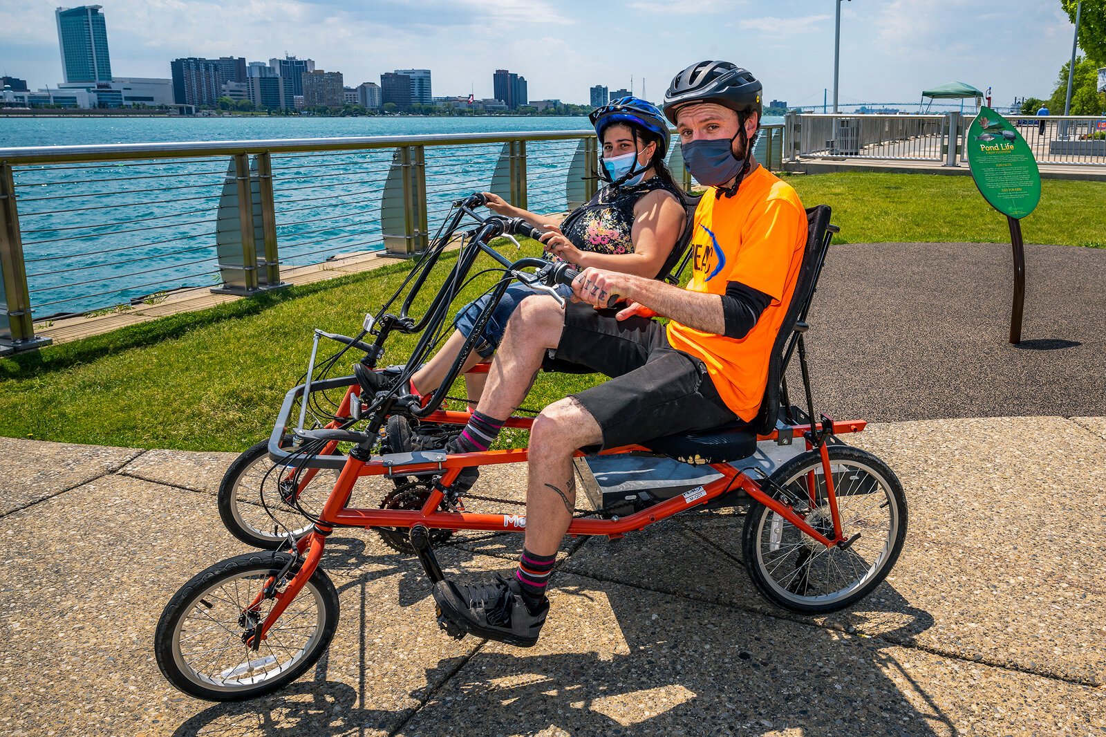 PEAC students Amanda Salinas and Owen Conley on MoGo adaptive cycles on the Detroit Riverwalk.