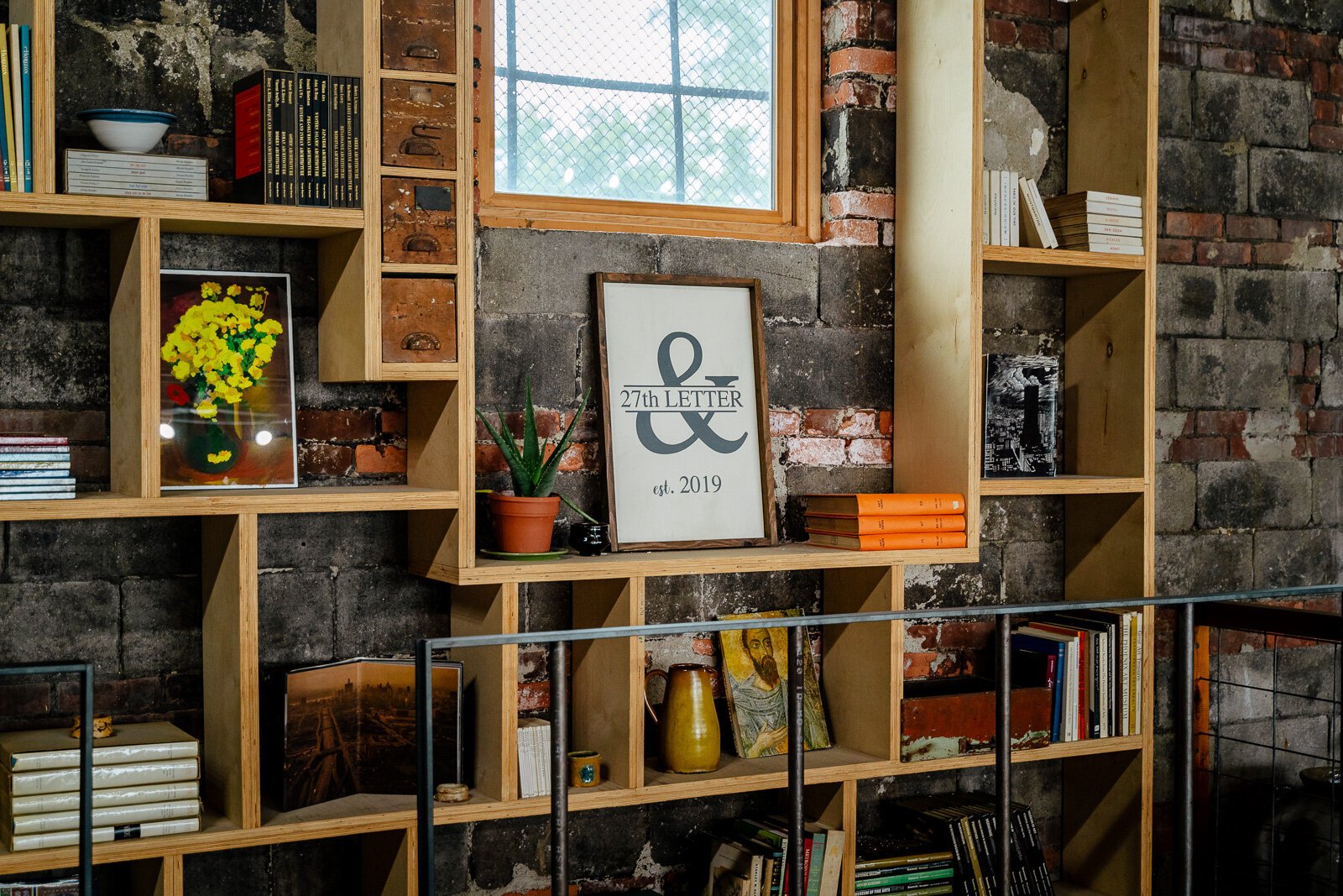 "The ampersand symbol represents everything we want to do, which is bring people together," says co-owner Drew Pineda. "We want to be a bookstore AND...a place to convene, write, explore ideas and art."