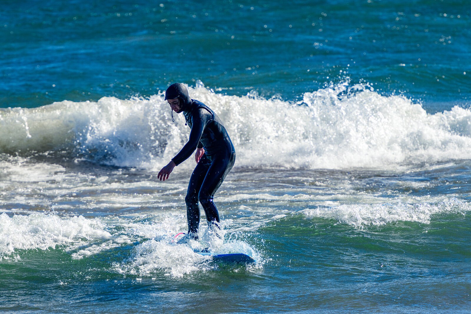 Surfing on Bete Grise. Photo by Doug Coombe.