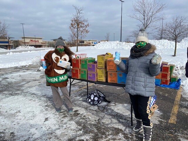 Girl Scouts display the cookies available for sale at a recent Cookie Booth