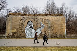 People walking along the Dequindre Cut in Detroit.