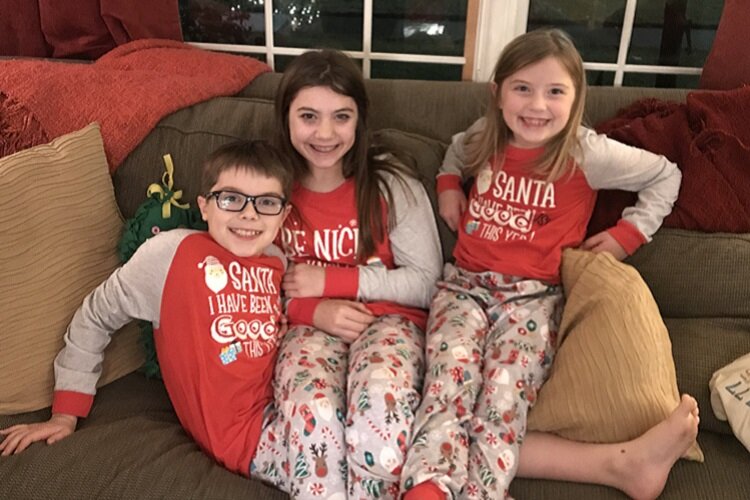 Emma Hanoian with siblings William, 10, and Molly, 8, on Christmas night.