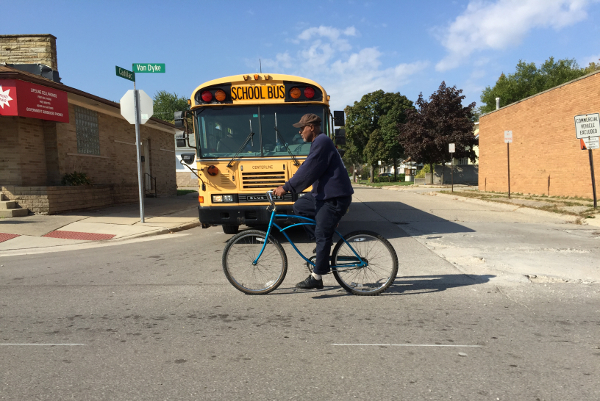 A cyclist rides in a bike lane on Van Dyke in Warren