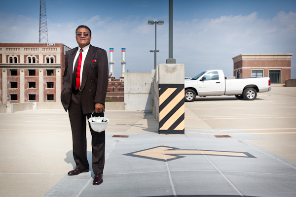 Portriat of George Stewart atop of the recently built 300 space parking structure located behind the Garden Theatre.