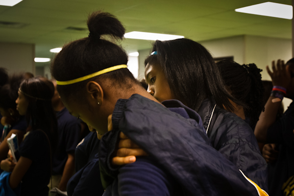 PEC's 9th Grade Academy students console each other during a Restorative Practice session on the effects of bullying.