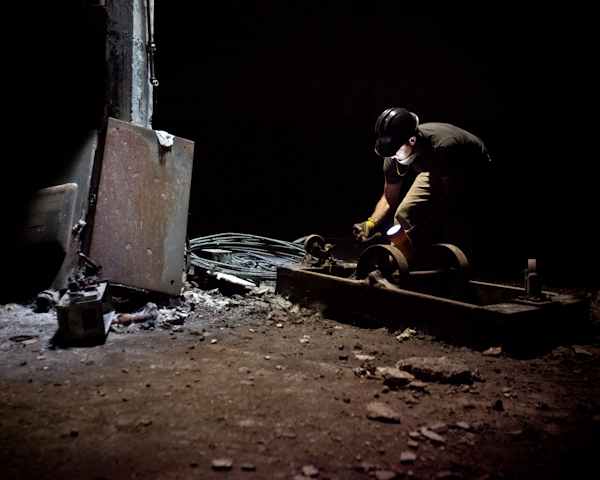 Jason Peet of Mend finds material at the American Beauty buidling to repurpose.