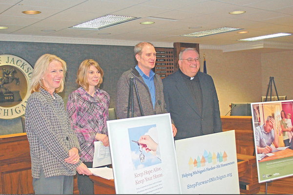 State housing administrators joined Jackson-area local officials and faith leaders during a press conference at Jackson City Hall to promote the Step Forward Michigan Faith Partnership