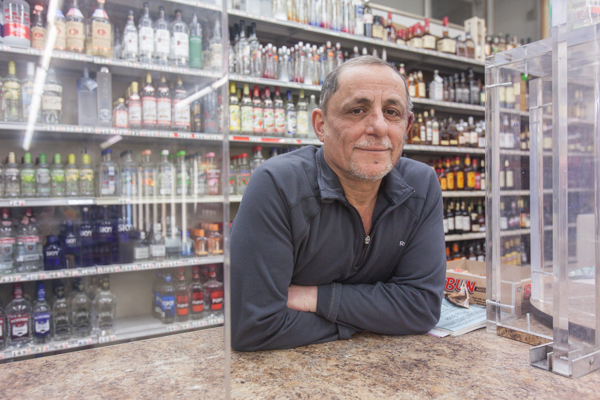 At the counter of Marcus Market, a recipient of MDI's facade grant