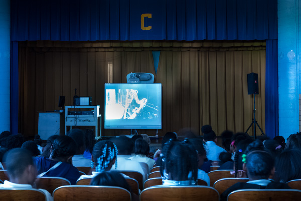 Students at Cooke Elementary watch the DSO via webcast