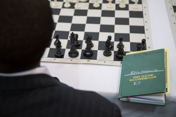 A Young Detroit chess player wait to play Grandmaster Hikaru Nakamura 