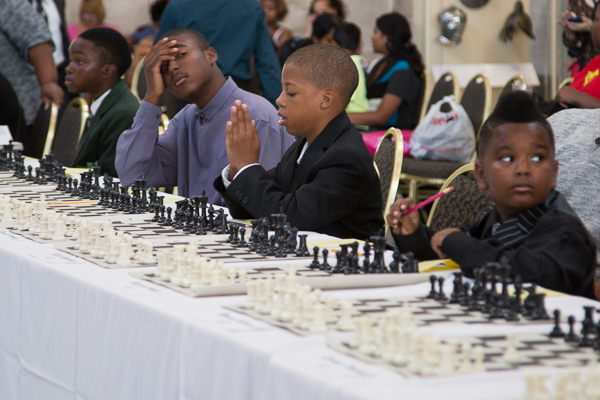 Young Detroit chess players wait to play Grandmaster Hikaru Nakamura 