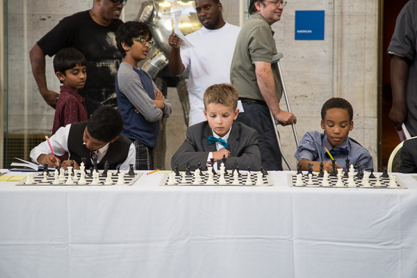 Young Detroit chess players wait to play Grandmaster Hikaru Nakamura 