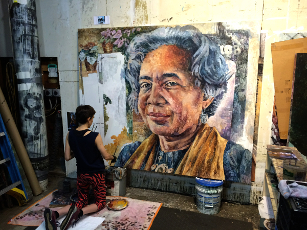 Nicole Macdonald working on her portrait of Melba Joyce Boyd