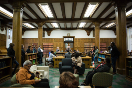 Frank Rashid addresses a group of visitors inside of the library at Marygrove College
