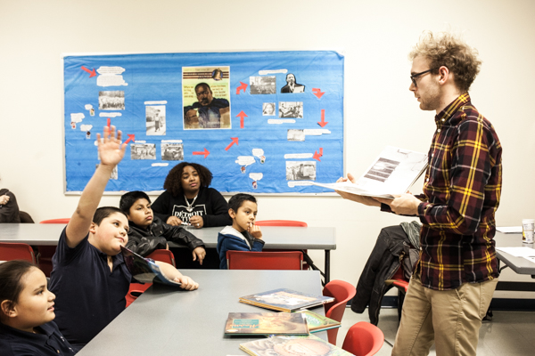 Brandan Pierce of 826Michigan leads a writing workshop at the Campbell Branch Library