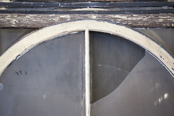 Windows waiting to be restored at the workshop of Turner Restoration