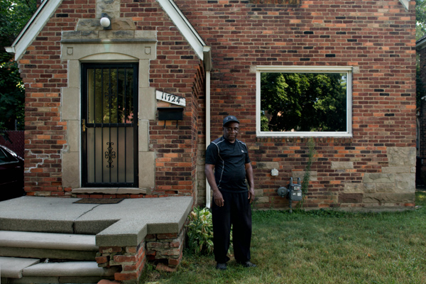 Walter Hicks in front of his home on Detroit's west side