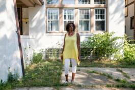 Arleen Alan Hunter in front of her home, which she lost in Wayne County's 2014 tax auction