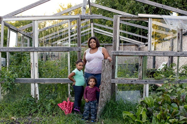 Erin Cole, co-owner of Nurturing Our Seeds, with her two children, Oshun and Asa