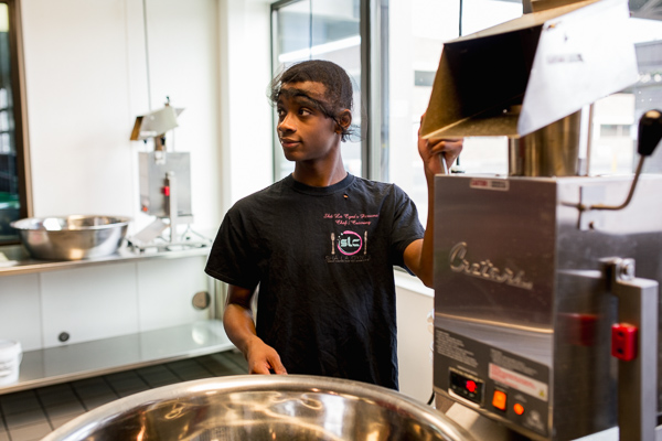 Davis' son Jordan helps with making popcorn