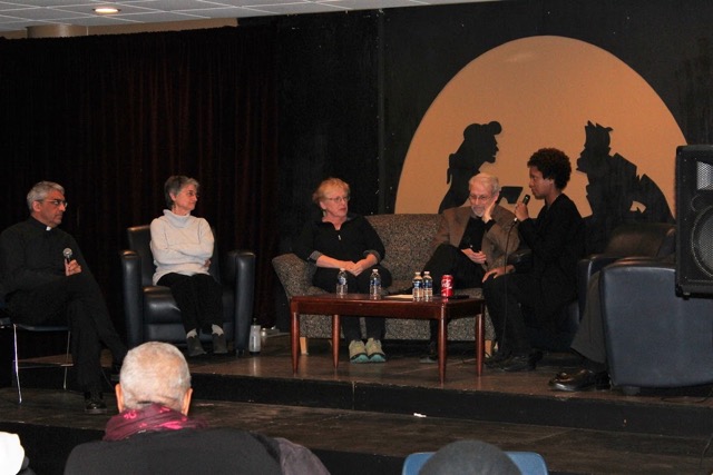 Members of UDM and Marygrove faculty on the stage with Live6 director Lauren Hood