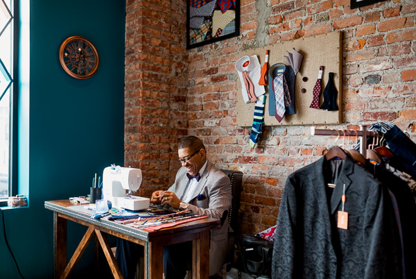 Beaman making one of his custom ties