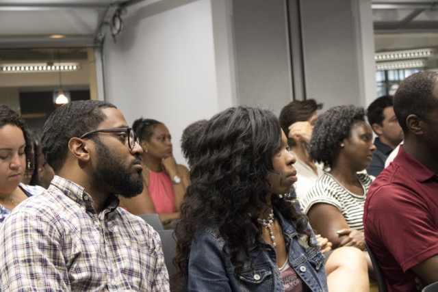 Audience listens intently to the panel on "Failure"