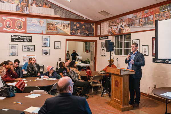 Eli Savit from the Mayor's Office speaks at a community meeting in Delray on air quality