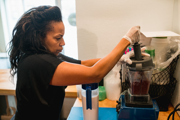 Monique Dooley makes a smoothie