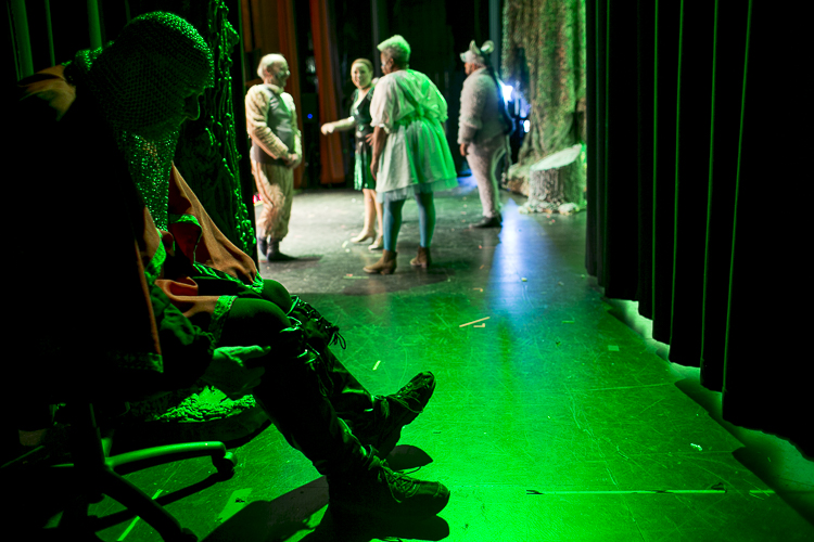 George Evalt sits back stage before a performance of Shrek: The Musical