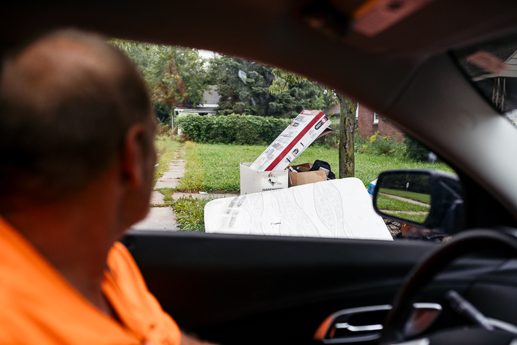 Joe observes some bulk trash put out on the wrong day.